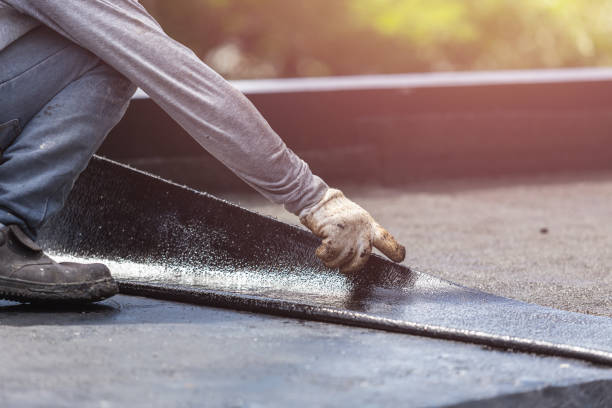 Professional Basement Waterproofing technician working in Clifton, TN